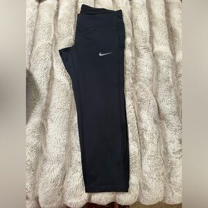 Nike dri fit crop running leggings w/ mesh at bottom.